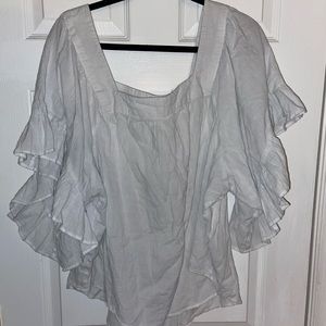 Blouse with ruffled sleeves